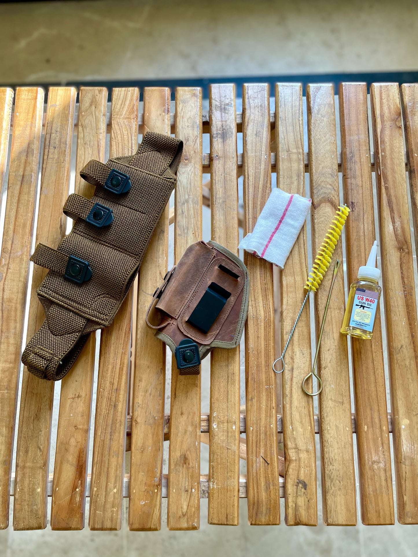 3 in 1 deal, 1x Black round belly belt, 1x leather iwb/owb clipper, 1x cleaning kit